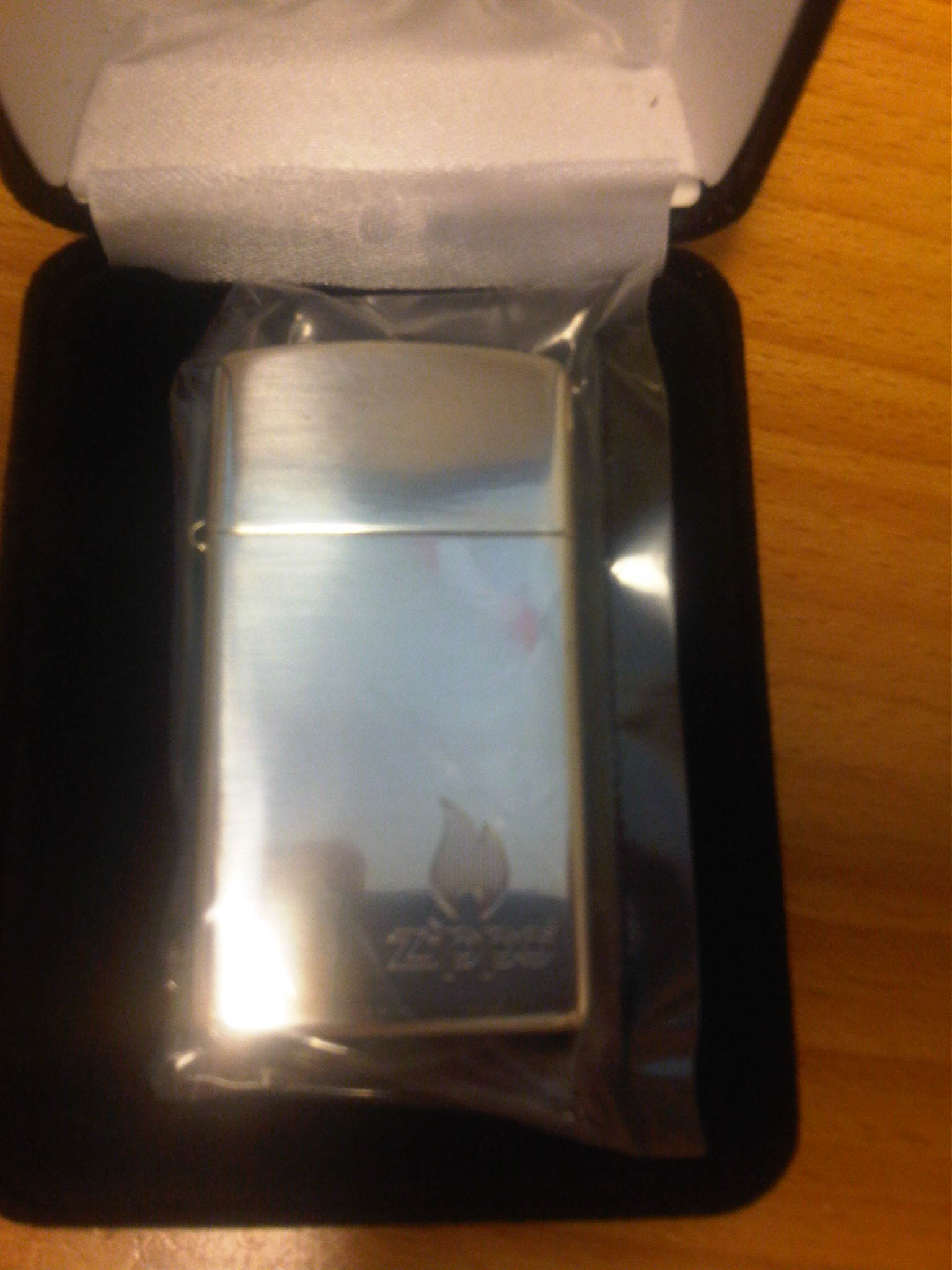 Zippo Sterling Silver Logo & Flame Limited Neu klein.jpg